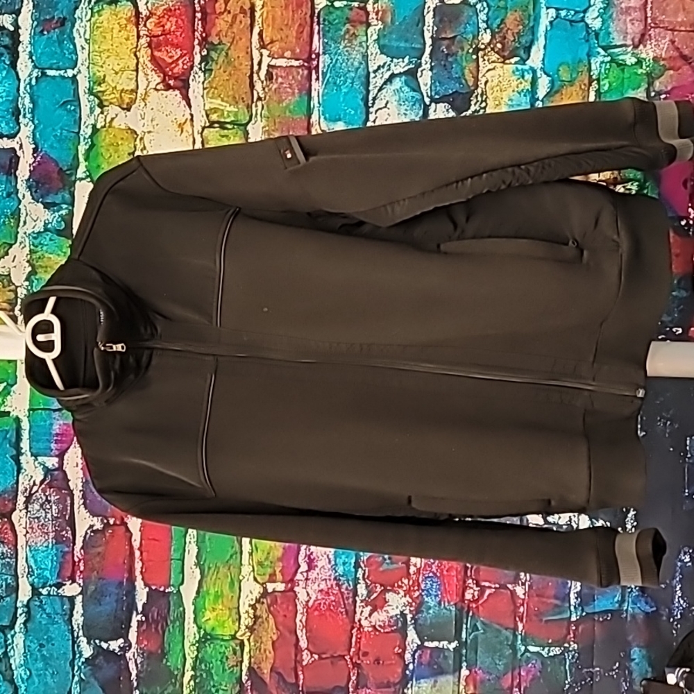Tommy Hilfiger jacket size LG.